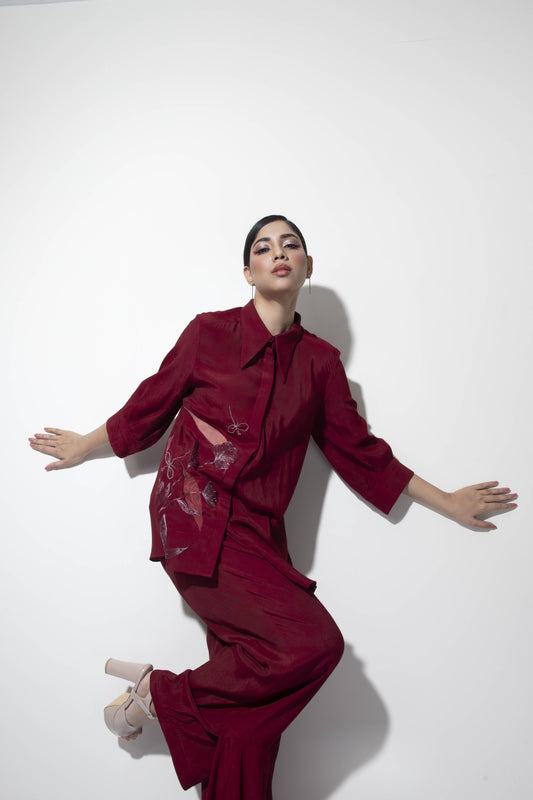 Asymmetric Bias Shirt with Dragon-fly Embellishment paired with Frilled Trousers